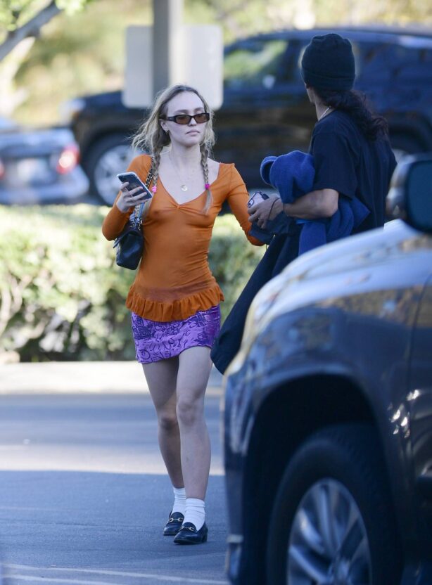 Lily-Rose Depp - In a purple mini skirt out to dinner in Los Angeles