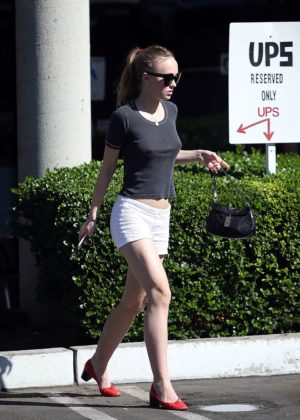 Lily Rose Depp: Wearing T shirt and red shoes -04 – GotCeleb