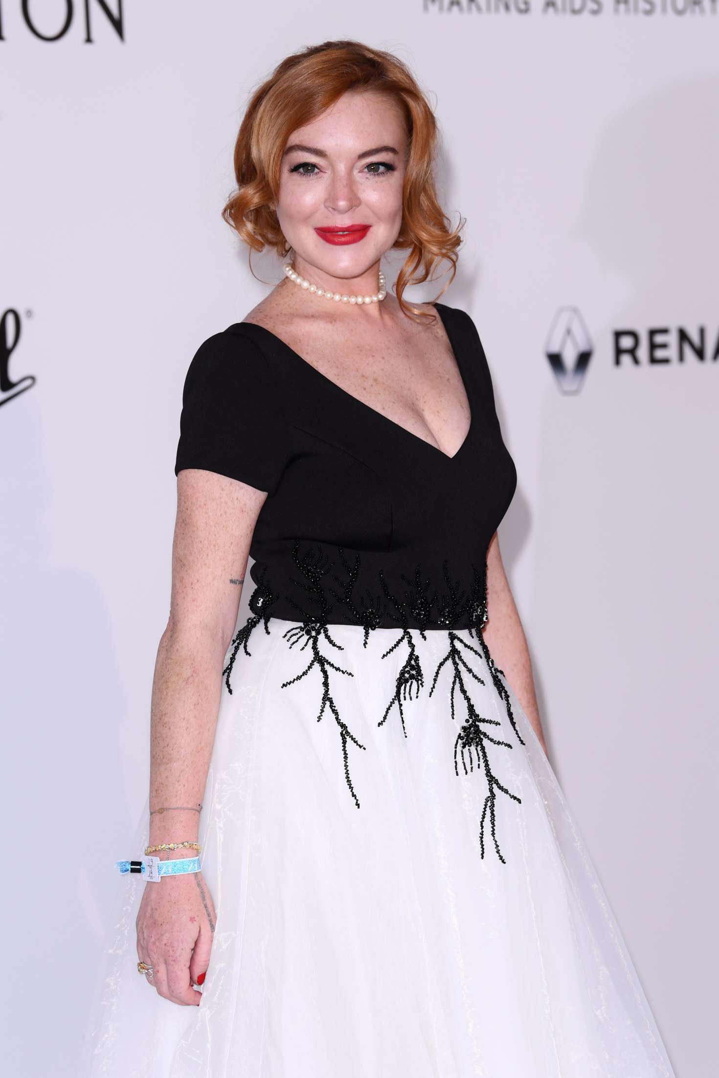Lindsay Lohan - amfAR's 24th Cinema Against AIDS Gala in Cannes