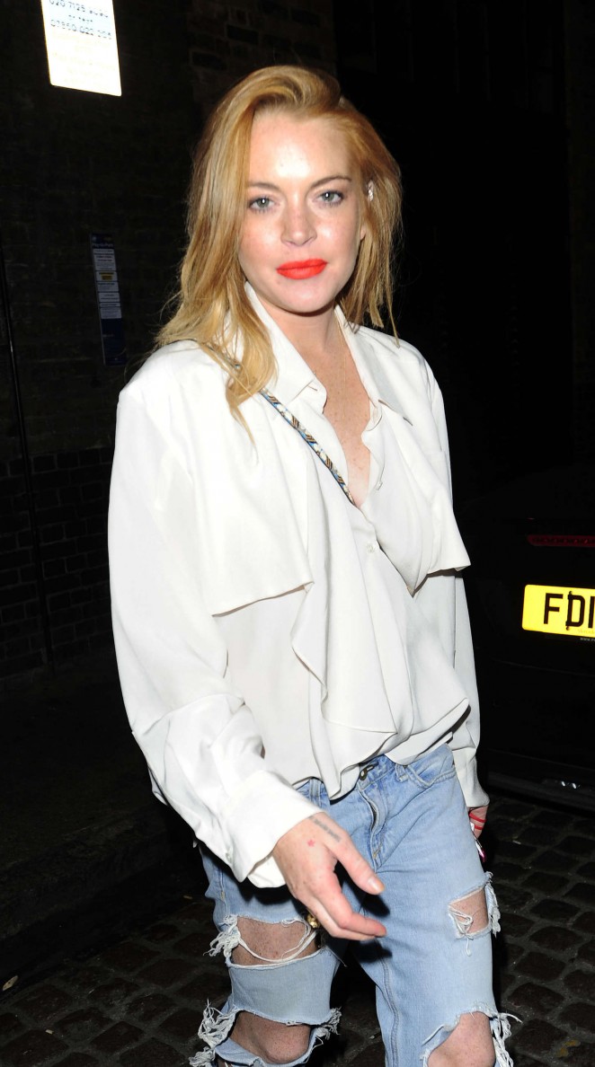 Lindsay Lohan in Ripped Jeans at Chiltern Firehouse in London