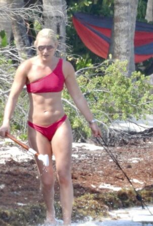 Lindsey Vonn - In a red bikini paddle board in Tulum