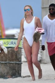 Lindsey Vonn in White Swimsuit on the beach in Miami