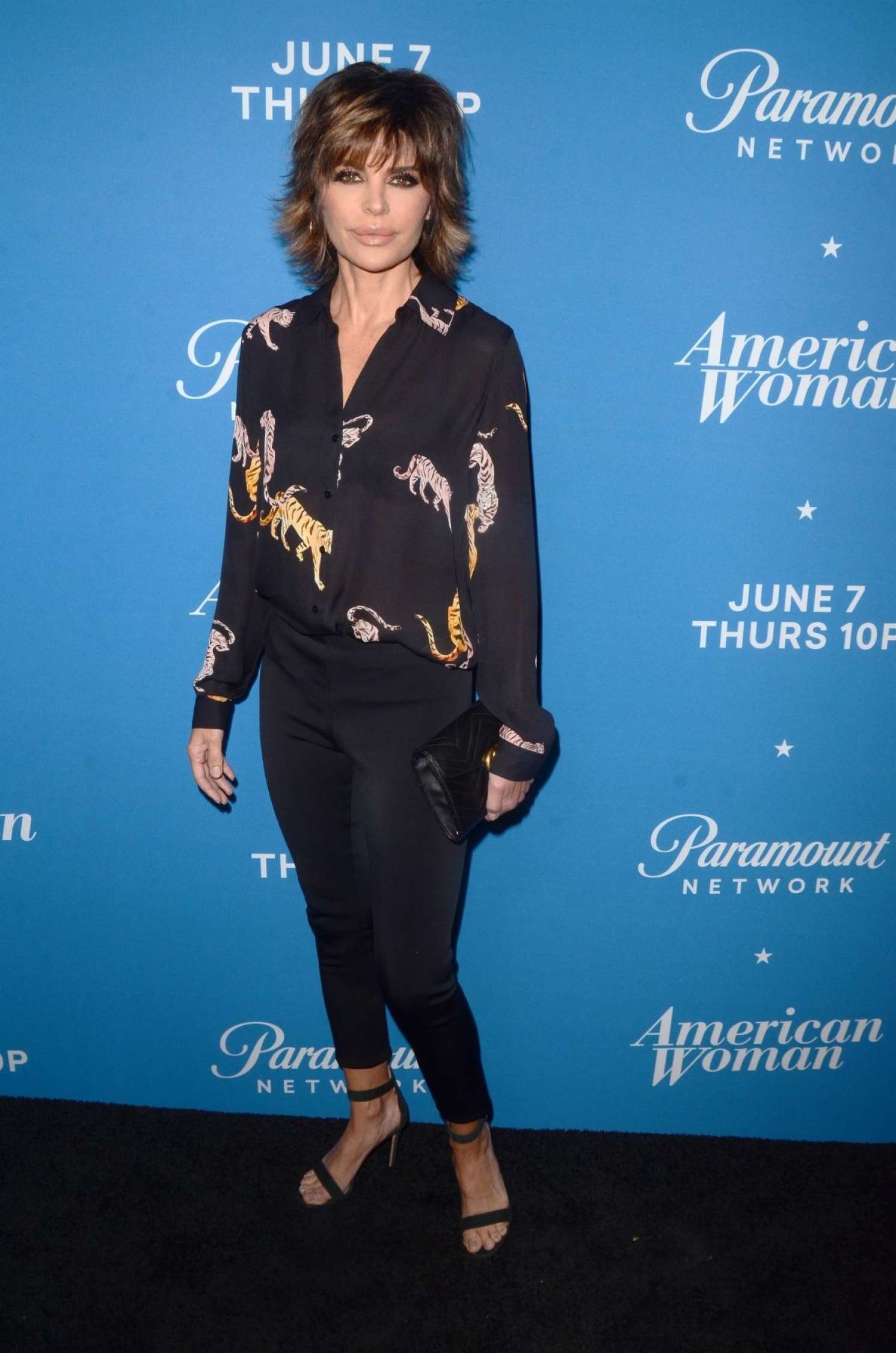 Lisa Rinna Photocall For American Woman Premiere Party In Los Angeles