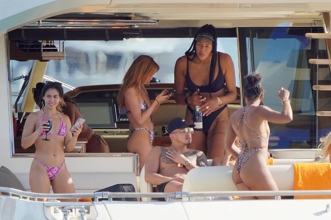 Liz Cambage - On a yacht with friends and champagne showers 