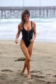 Lizzie Cundy in Black Swimsuit on the beach in LA