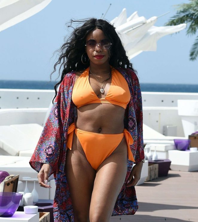 London Hughes in Orange Bikini at a pool party in Cape Verde
