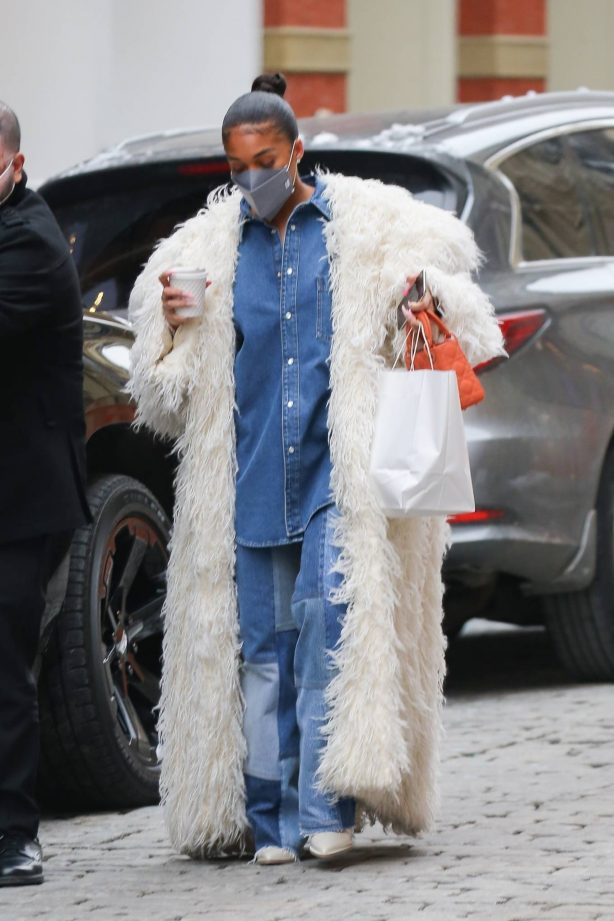 Lori Harvey - In white fur coat while shopping in SoHo