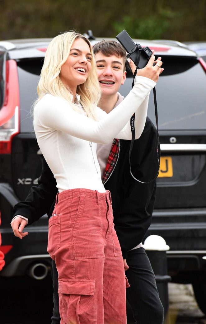 Louisa Johnson with a fan outside Key 103 Radio Station in Manchester