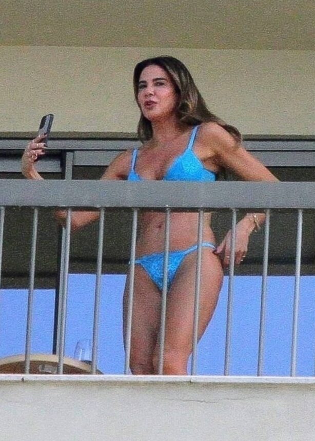 Luciana Gimenez - In a blue bikini on the balcony of her hotel in Rio de Janeiro