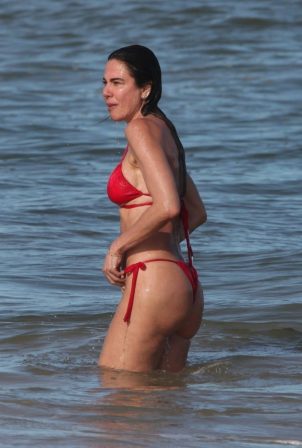Luciana Gimenez - In red bikini at Praia Trancoso Beach in Bahia - Brazil