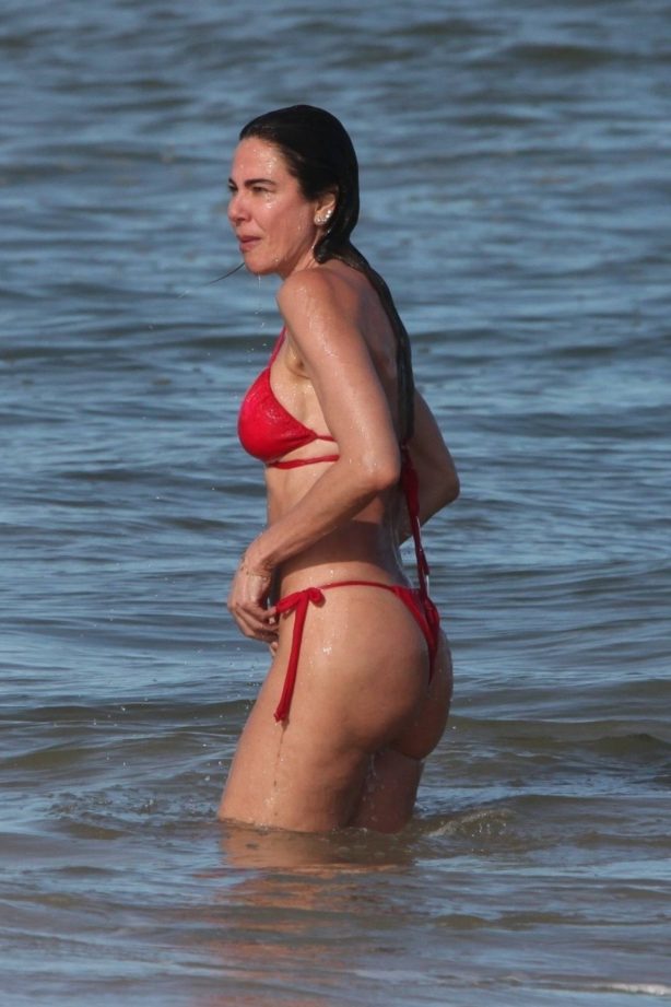 Luciana Gimenez - In red bikini at Praia Trancoso Beach in Bahia - Brazil