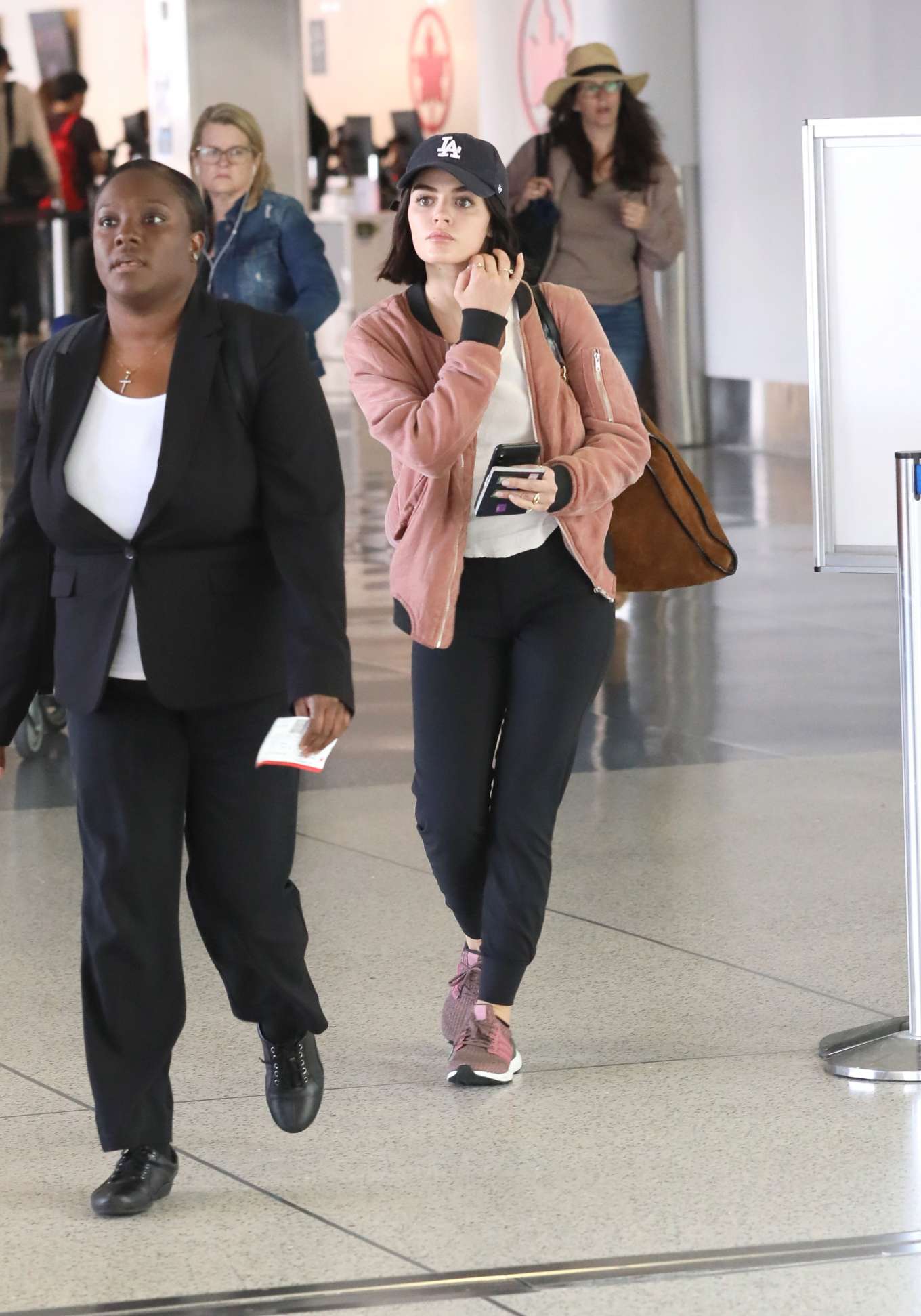 Lucy Hale â€“ Arrives at LAX International Airport in LA