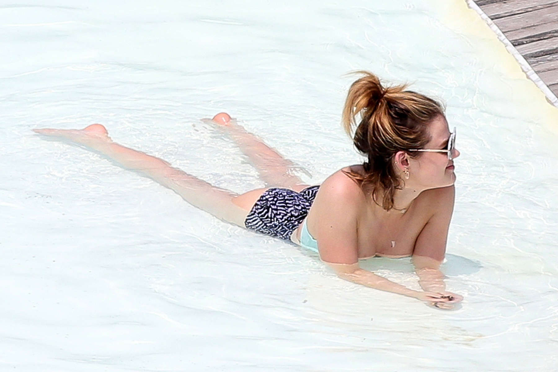 Lucy Hale - Bikini Candids at a Pool in Brazil. 