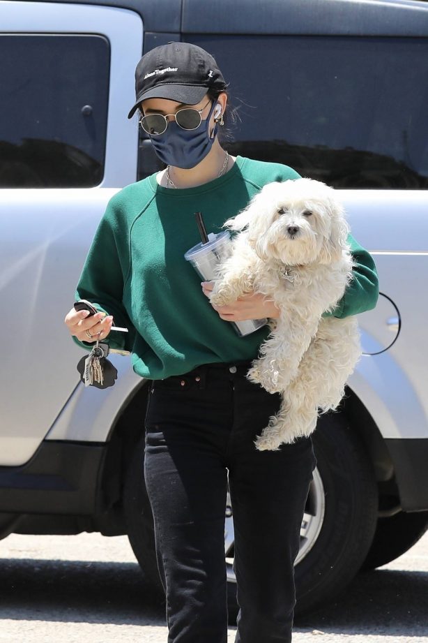 Lucy Hale - Heads to the dog park with her dog Elvis in Studio City
