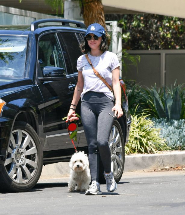 Lucy Hale - In leggings out for a dog walk