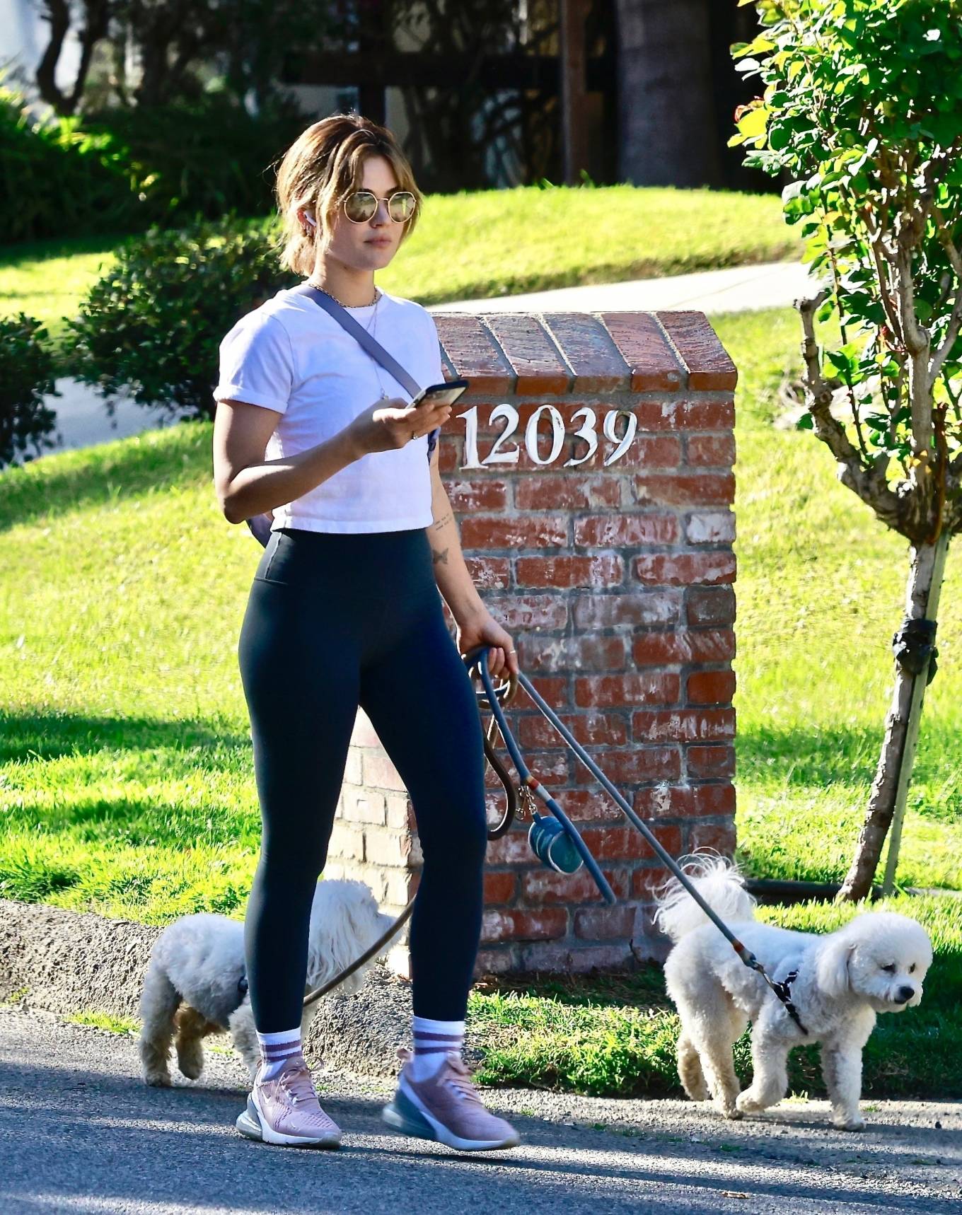 Lucy Hale - Seen while walking her two dogs in Studio City