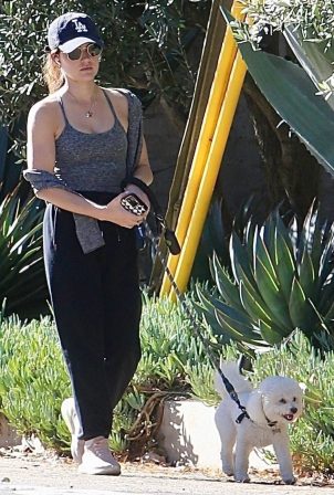 Lucy Hale - Seen with her dog in LA