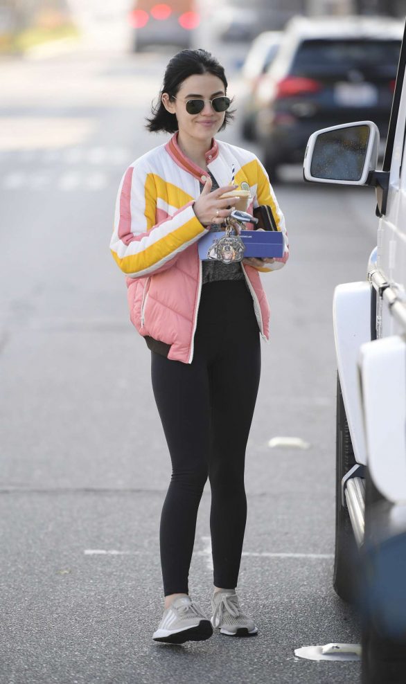 Lucy Hale smiles while on a coffee run after in Los Angeles