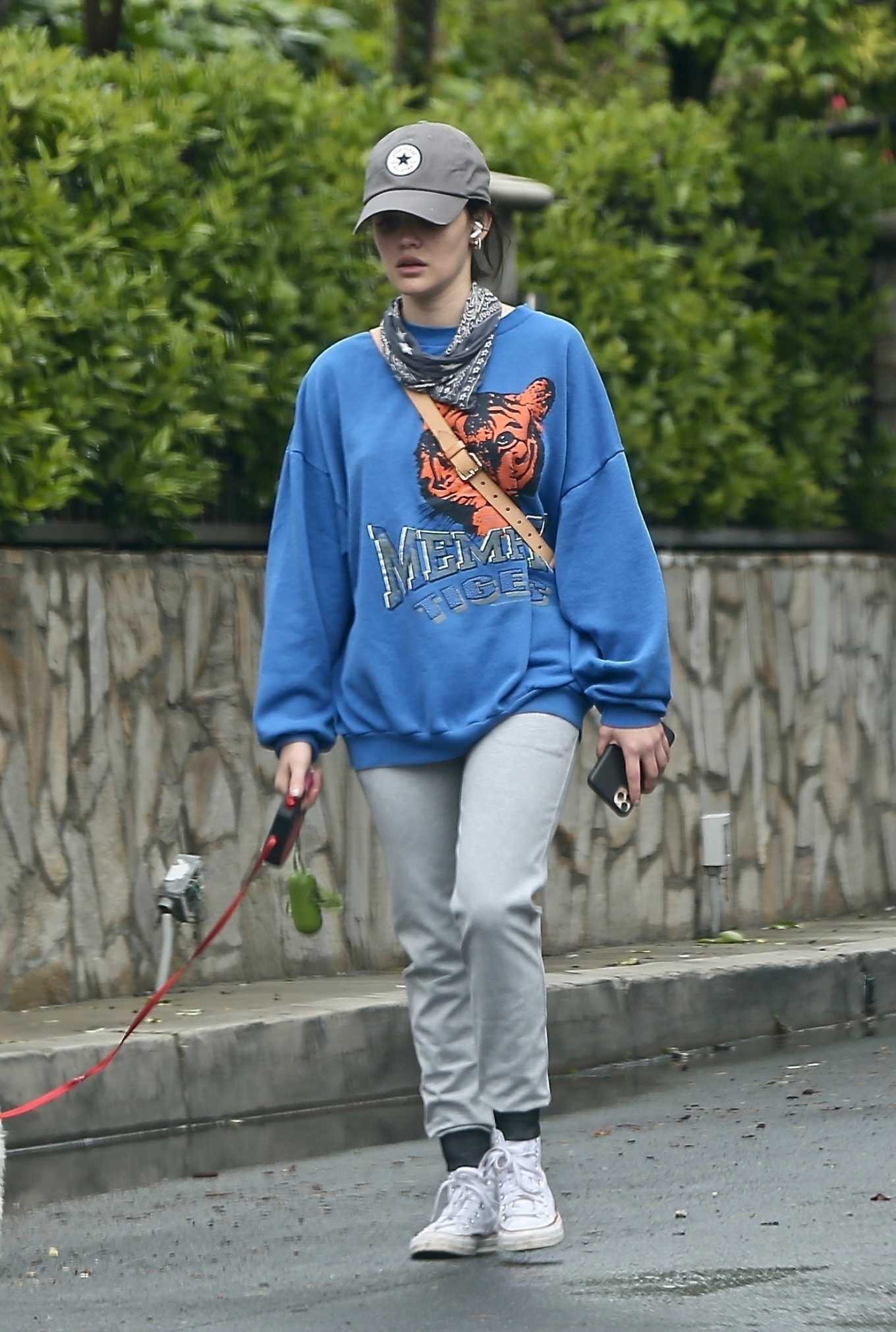 Lucy Hale â€“ Spotted while walking her dog Elvis in Los Angeles