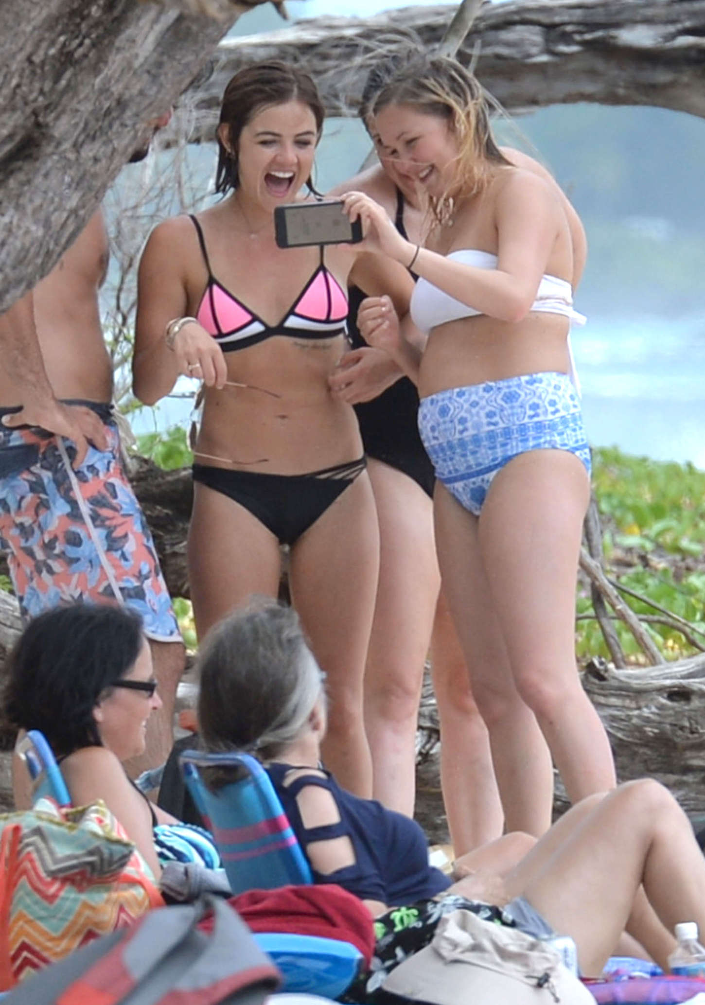 Lucy Hale - Wearing Bikini at a beach in Hawaii. 