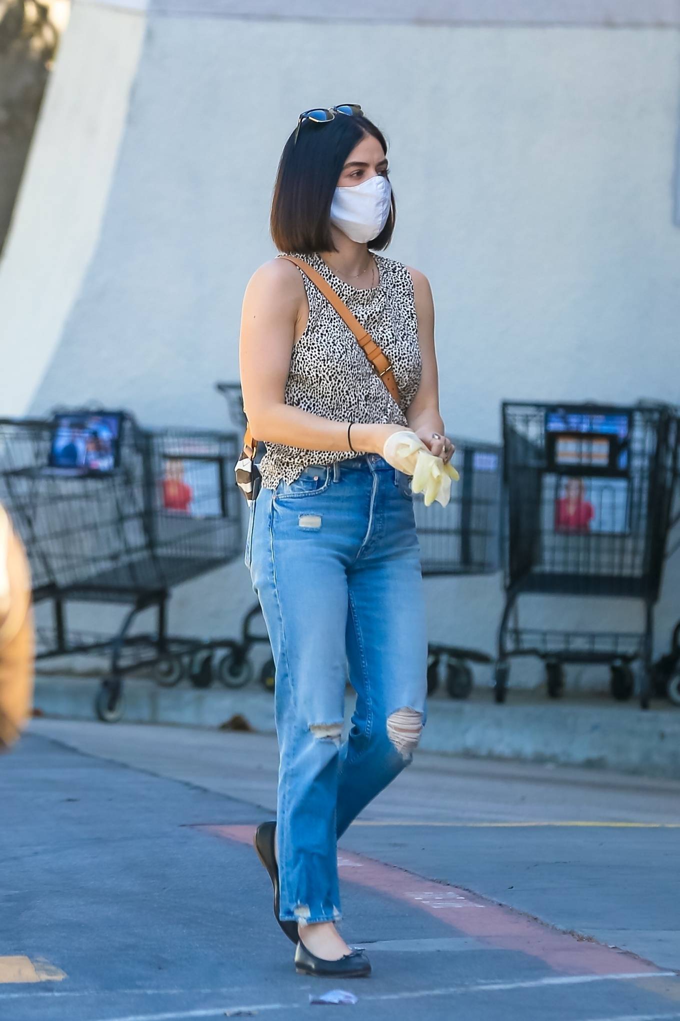 Lucy Hale â€“ Wears protective gear while goes for shopping