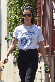 Lucy Hale with her dog Elvis - Out in Los Angeles