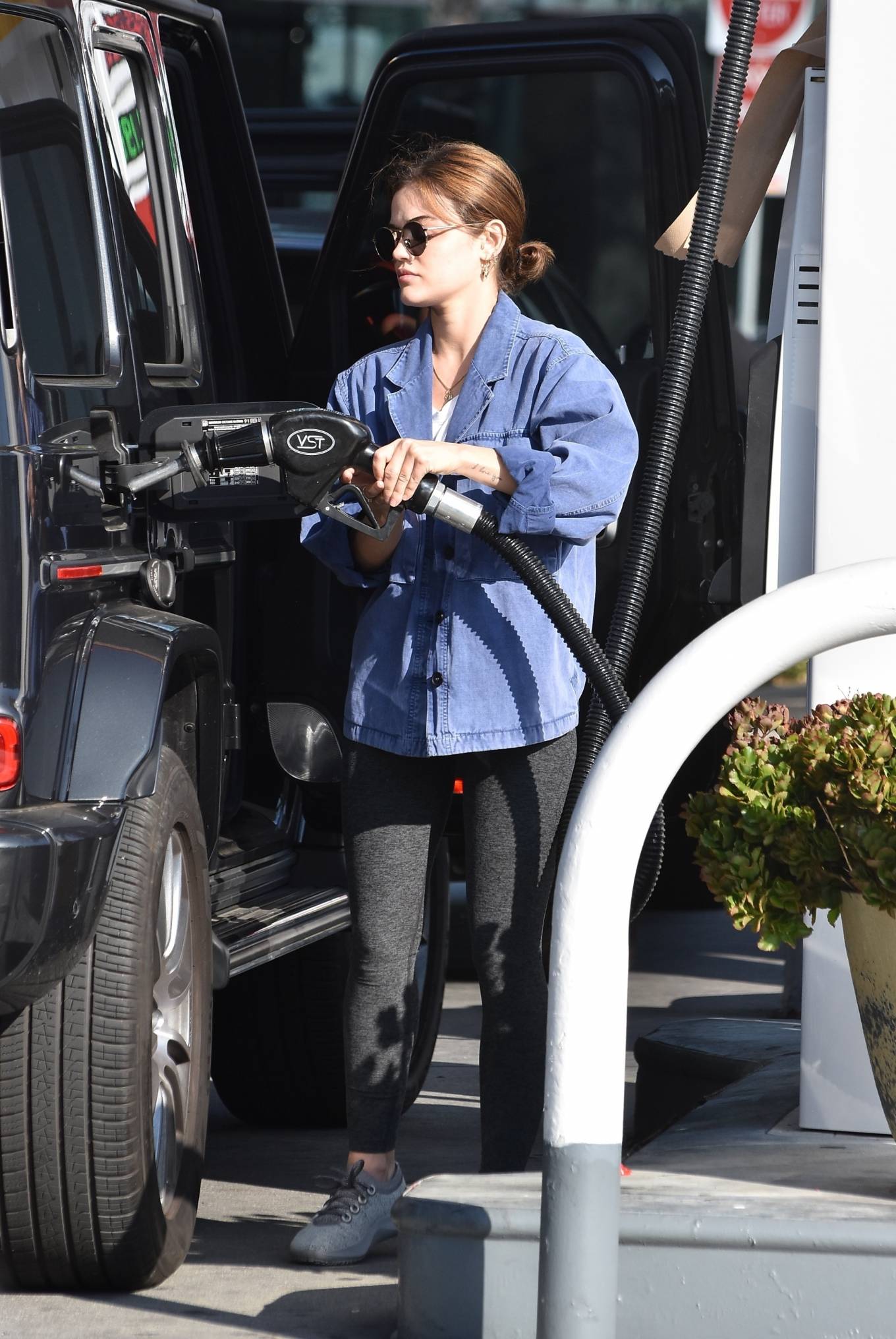 Lucy Hale - With new puppy Ethel at gas station in Studio City