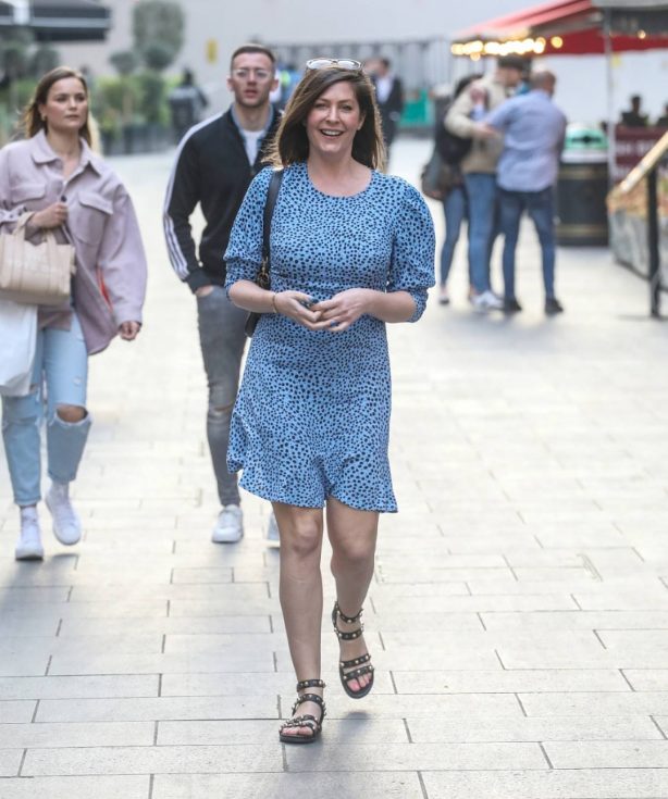 Lucy Horobin - In a blue dress departing her Heart Dance show in London