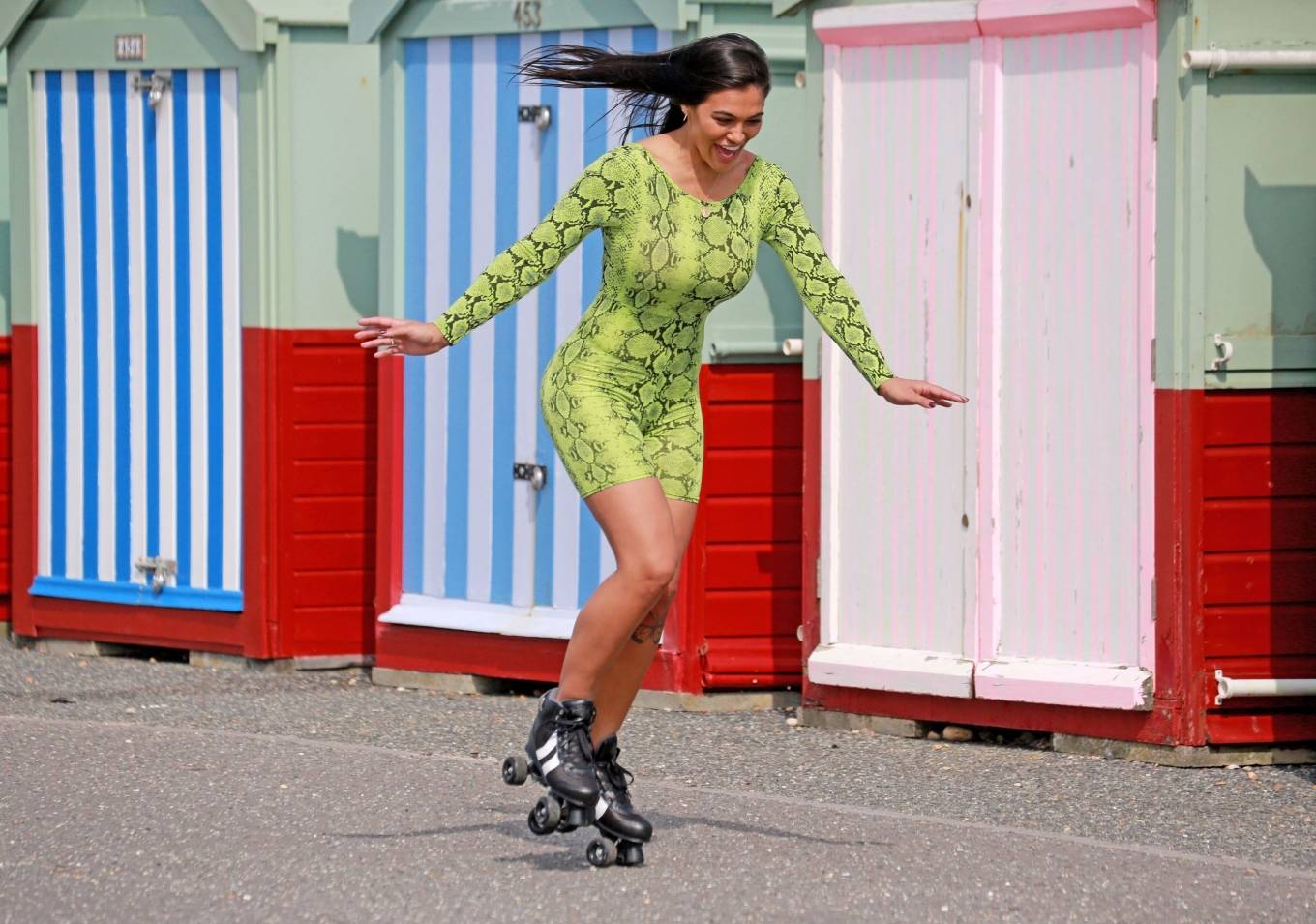 Lydia Clyma 2020 : Lydia Clyma - Rollerblading in a green snakeskin outfit ...