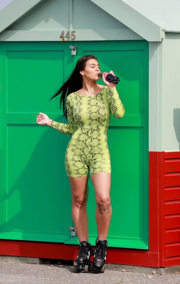 Lydia Clyma - Rollerblading in a green snakeskin outfit in Portsmouth