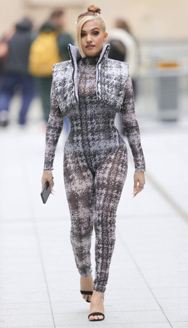 Mabel - Out in a futuristic print catsuit in London