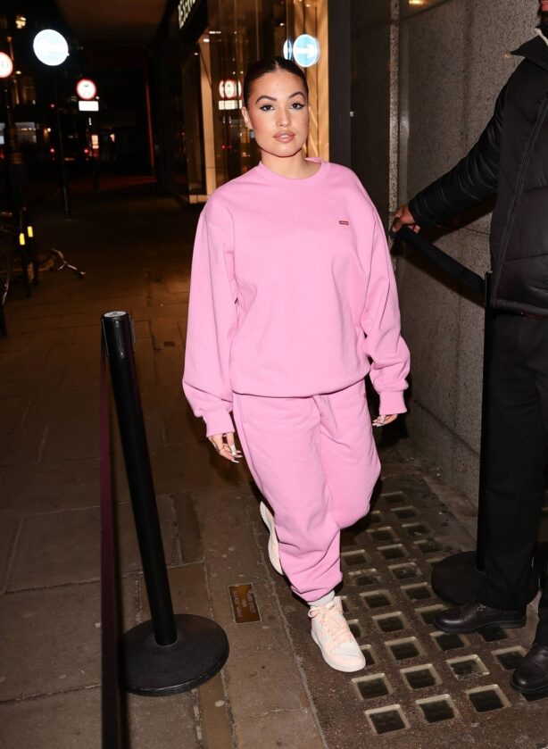 Mabel - Rocks in a pink tracksuit pictured at a cocktail bar in London