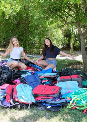 Maddie and Mackenzie Ziegler - Pack 750 backpacks to donate to foster kids and homeless teens in LA