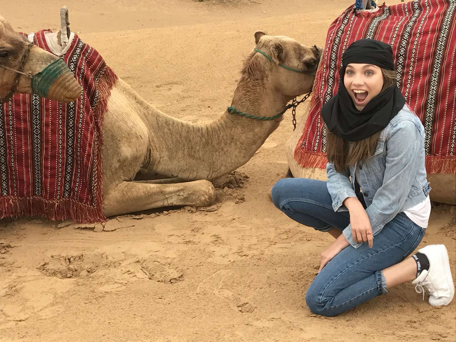 Maddie Ziegler riding a camel in Dubai