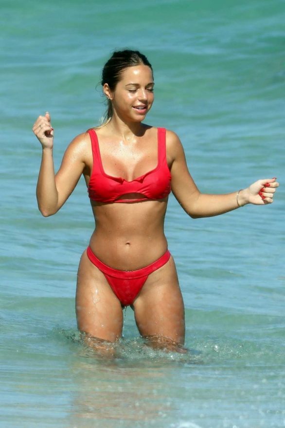 Maddy Burciaga in red bikini with Alexis Lechanet in Miami Beach