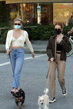 Madelaine Petsch and Lili Reinhart - Steps out with their dogs for a walk in Vancouver