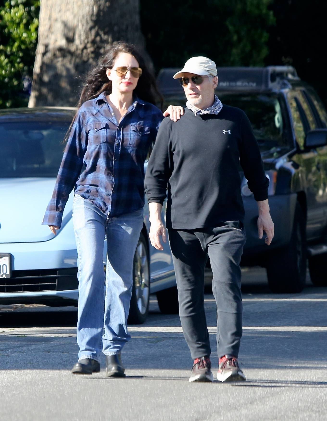 Madelaine Stowe â€“ Out for a stroll with husband Brian Benben in Pacific Palisades