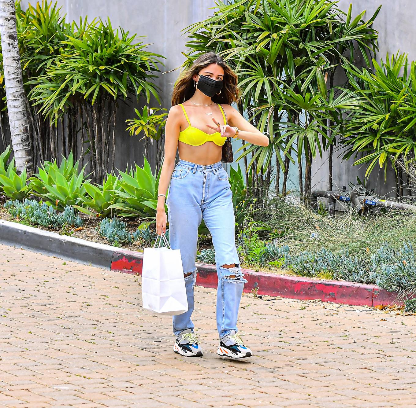 Madison Beer In A Surgical Mask And Yellow Bikini Top As She Grabs