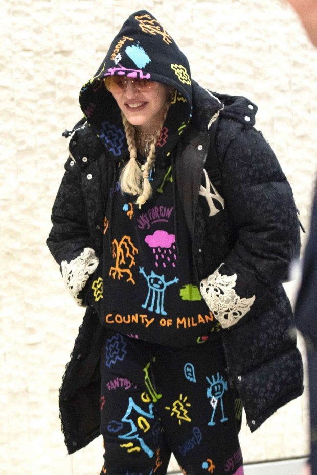 Madonna - Arrives at JFK Airport in New York City