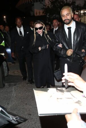 Madonna - Attends Burberry party with a mystery man in West Hollywood