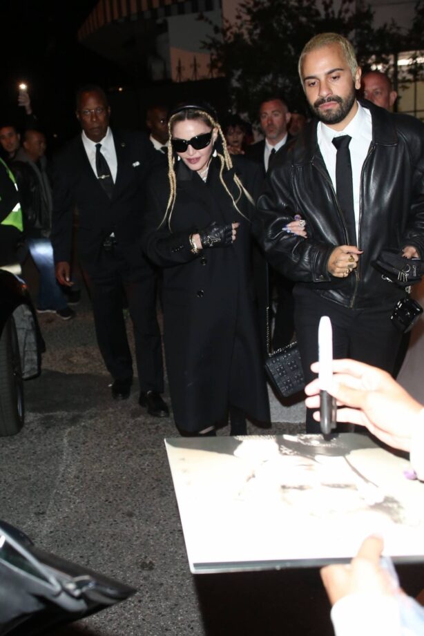 Madonna - Attends Burberry party with a mystery man in West Hollywood