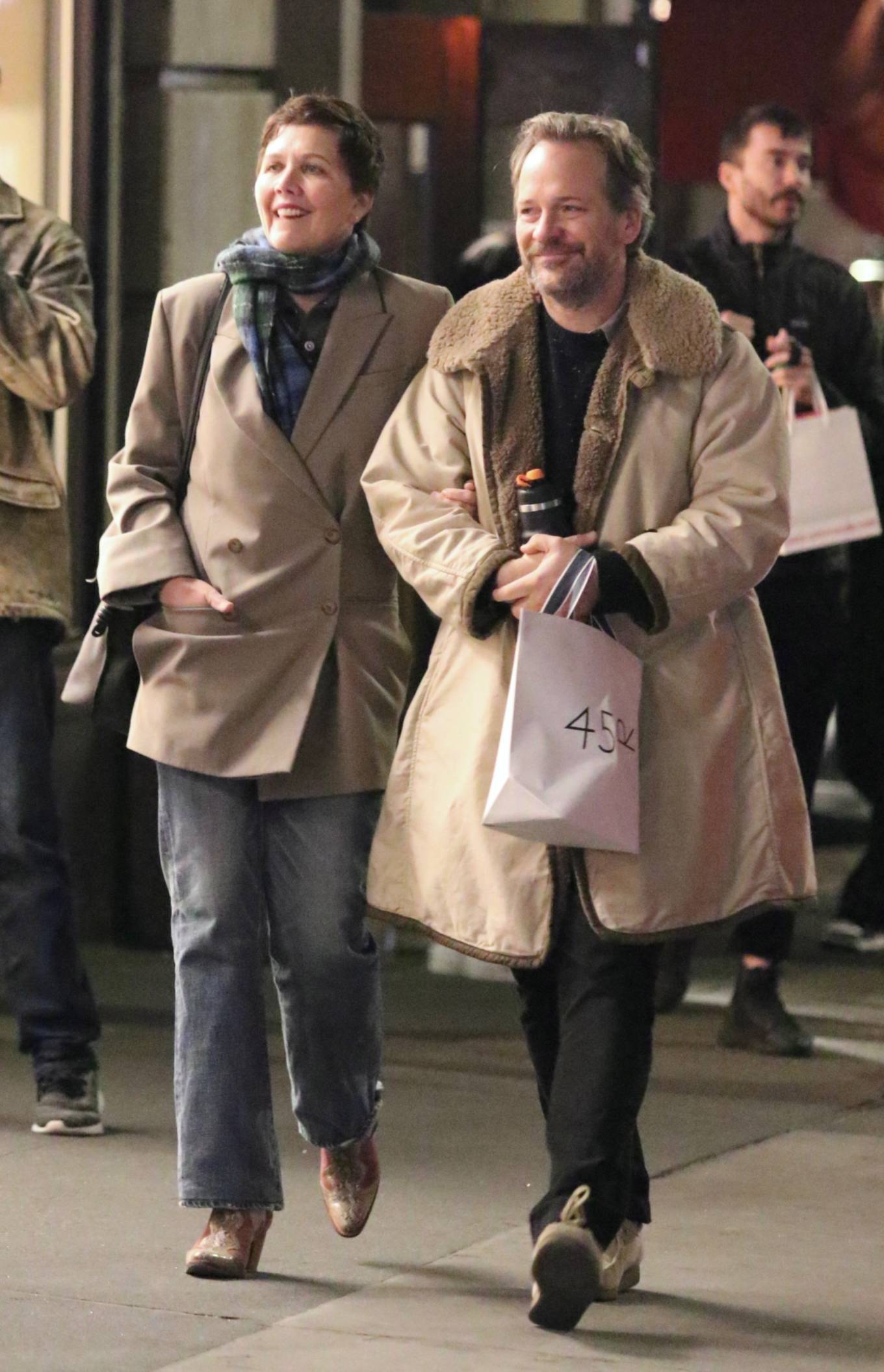 Maggie Gyllenhaal 2023 : Maggie Gyllenhaal – With husband Peter Sarsgaard seen during a romantic stroll in NYC-09