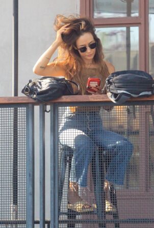 Maggie Q - Plays with her hair while at lunch in Hollywood