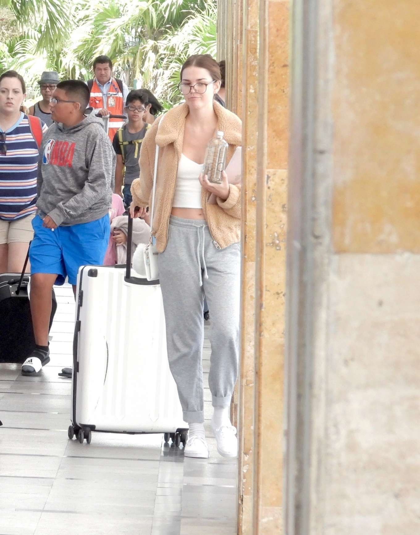 Maia Mitchell â€“ Arrives at Cancun airport in Tulum