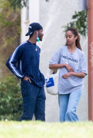 Malia Obama - With sister Sasha's new boyfriend Clifton Powell Jr. seen in the Park in L.A.