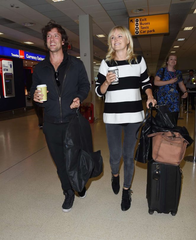 Malin Akerman and fiance Jack Donnelly - Arriving at Aberdeen Airport