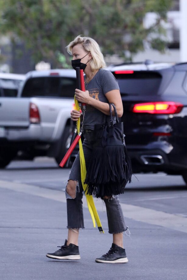 Malin Akerman - Carries sons nunchucks and yellow belt to karate class in Los Angeles
