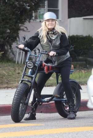 Malin Akerman - Rides her trusty two wheels in Los Angeles