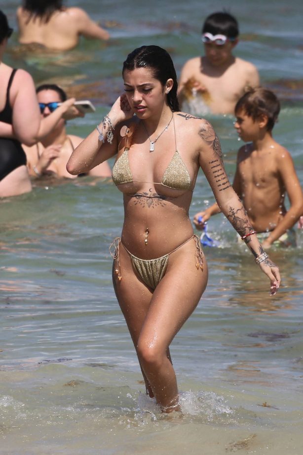 Malu Trevejo - In a gold bikini during a beach day in Miami