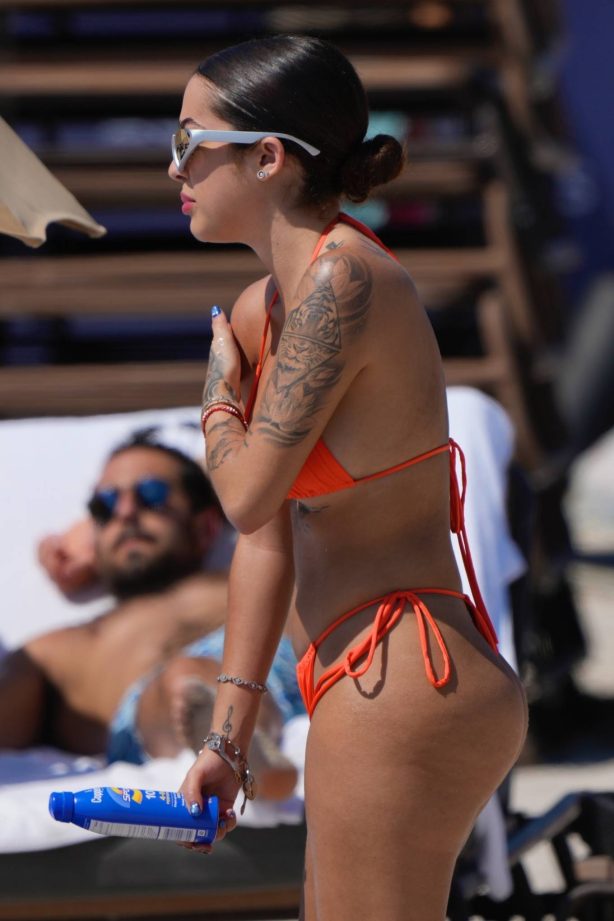 Malu Trevejo - In an orange bikini in Miami Beach